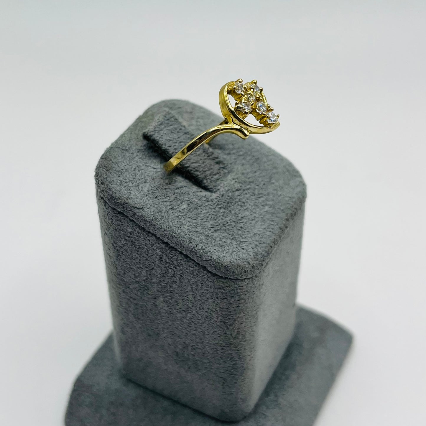 10k Gold Drifting Heart CZ Cross Ring