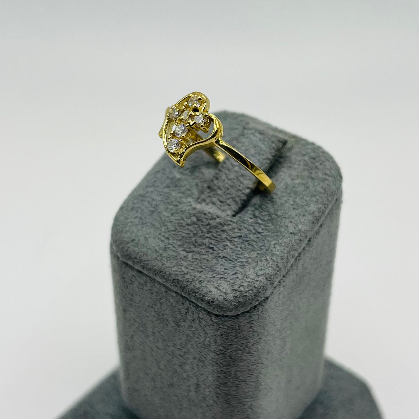 10k Gold Drifting Heart CZ Cross Ring