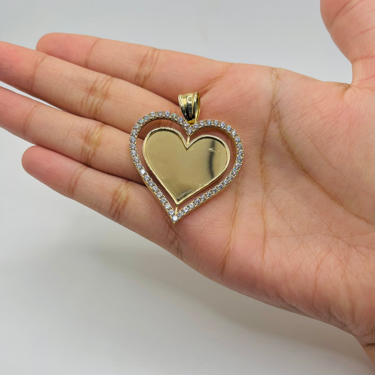 10k Gold Spinning Cz Heart Charm