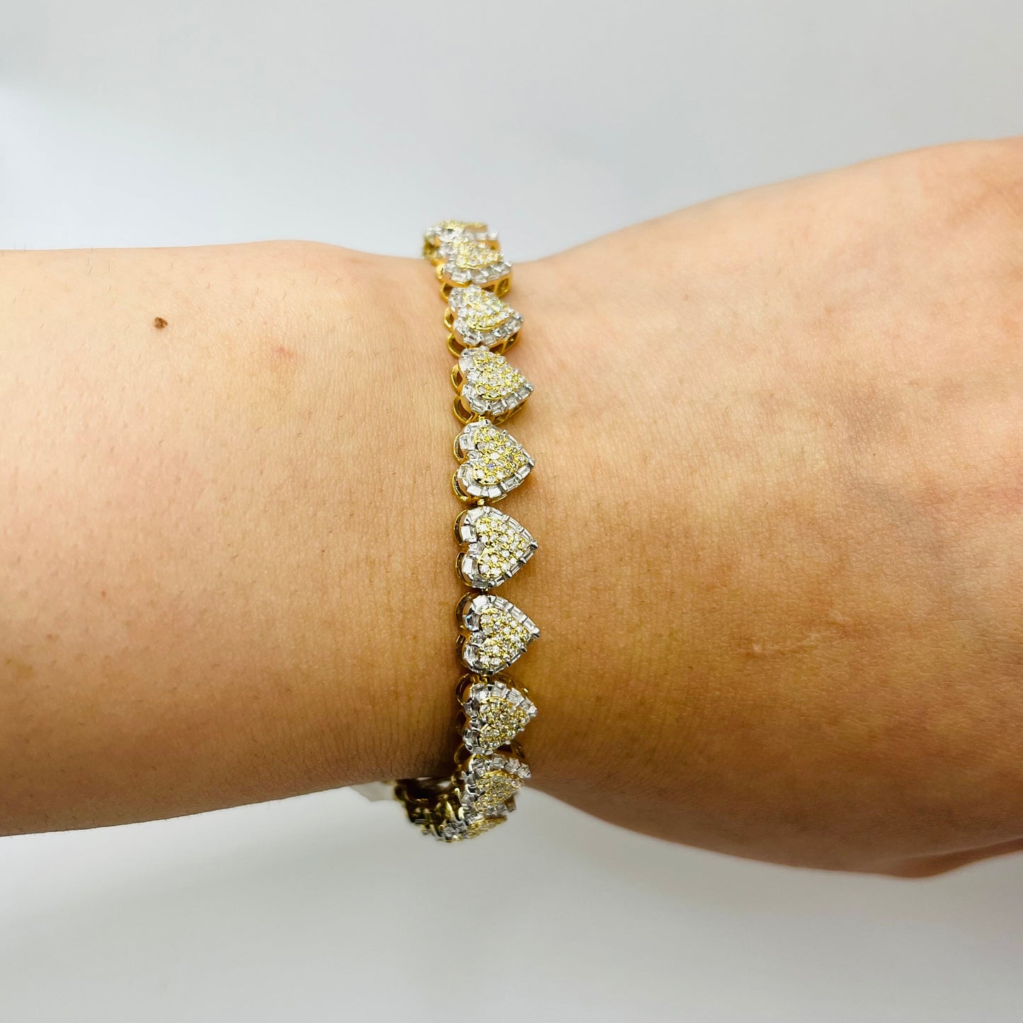 Two-Tone Baguette and Round Diamond Heart Cluster Bracelet
