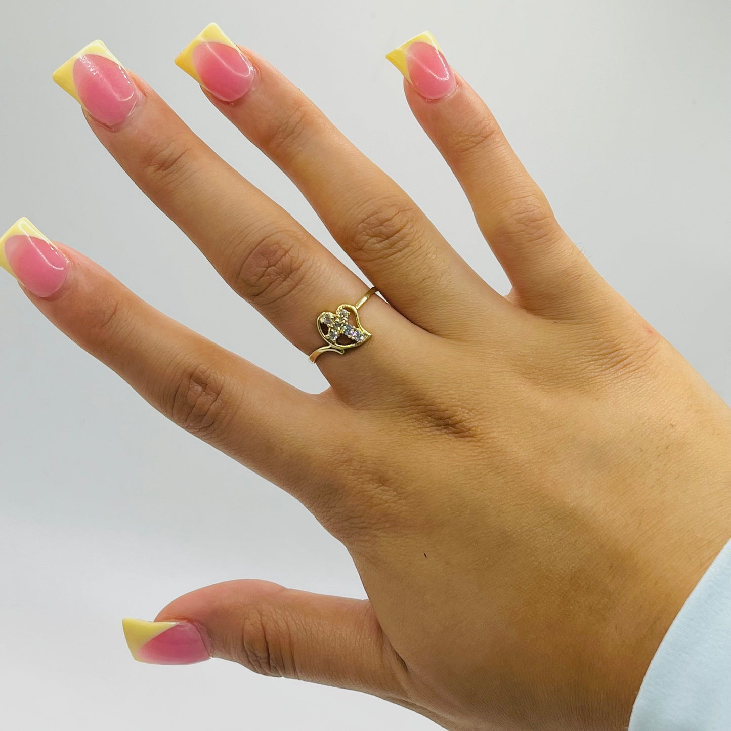 10k Gold Drifting Heart CZ Cross Ring