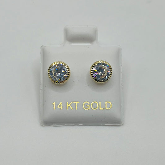 Pair of gold earrings with gemstones on a display card labeled '14 KT GOLD'.