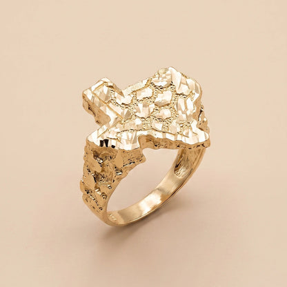 A 10K Gold Big Texas Nugget Ring with a sculptural, organic-shaped top, photographed on a solid beige background.