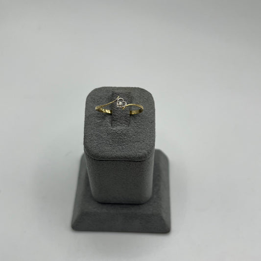 10K Gold ring with a cubic zirconia inside a heart 