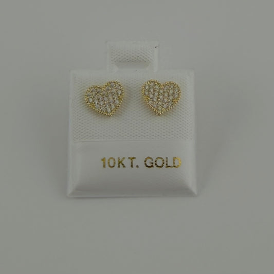 Heart-shaped gold earrings on a 10K gold card against a gray background