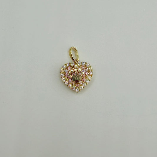 Heart-shaped pendant with pink and gold accents on a light gray background