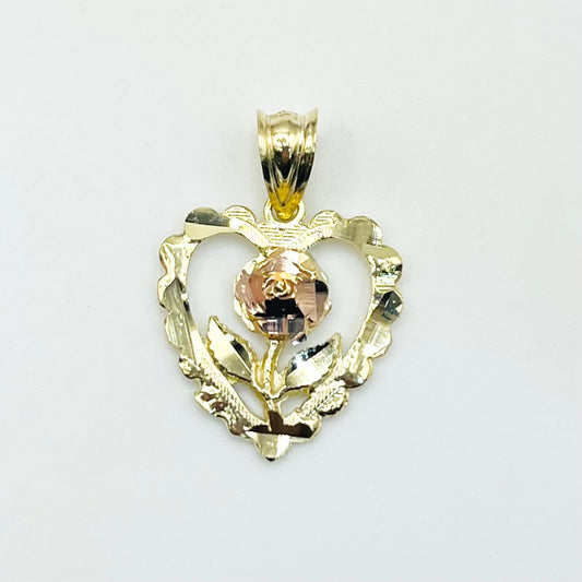 A 10K gold heart-shaped charm featuring a blooming rose with a delicate rose gold bud and yellow gold leaves and stem.