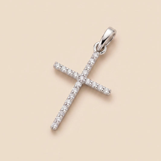 A 14K White Gold Diamond Dainty Cross Pendant featuring a sleek nail-inspired design adorned with delicate diamonds on the bail