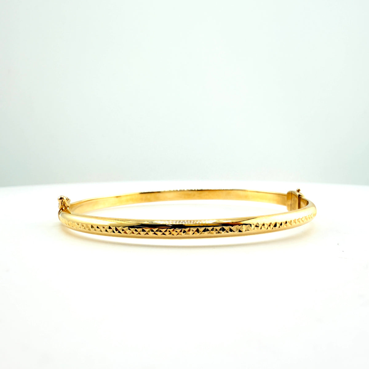 10K Gold Bangle Oval Hinged