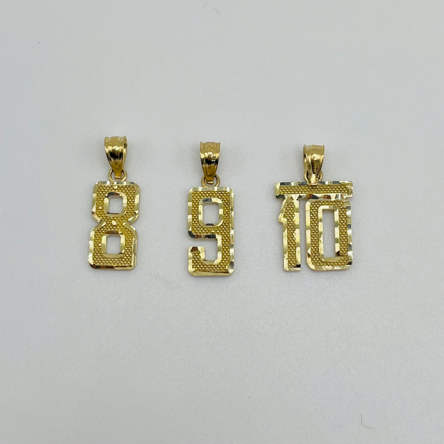 10k Gold Classic Dc Border Number Charm (S)