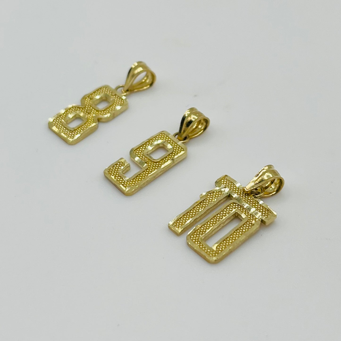 10k Gold Classic Dc Border Number Charm (S)