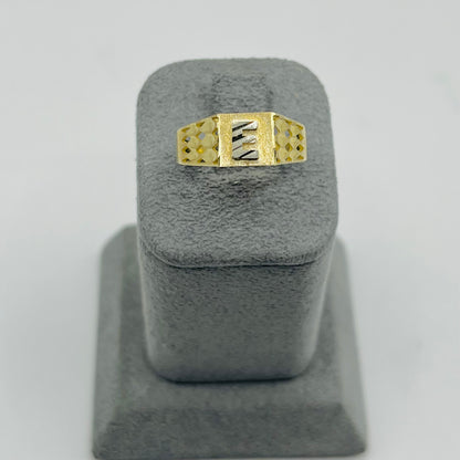 A 10K gold square initial ring displayed on a gray stand.