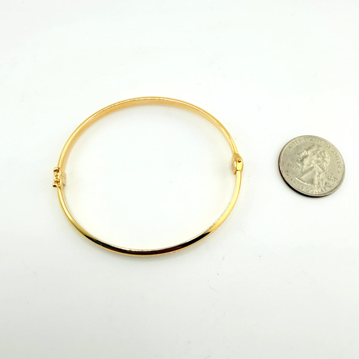 10K Gold Bangle Oval Hinged